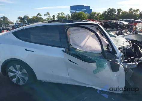 2022 Tesla Model Y Long Range Dual Motor All-Wheel Drive из США, поврежденный, VIN 7SAYGDEE3NF554851